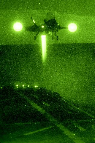 f-35b vertical night landing at sea