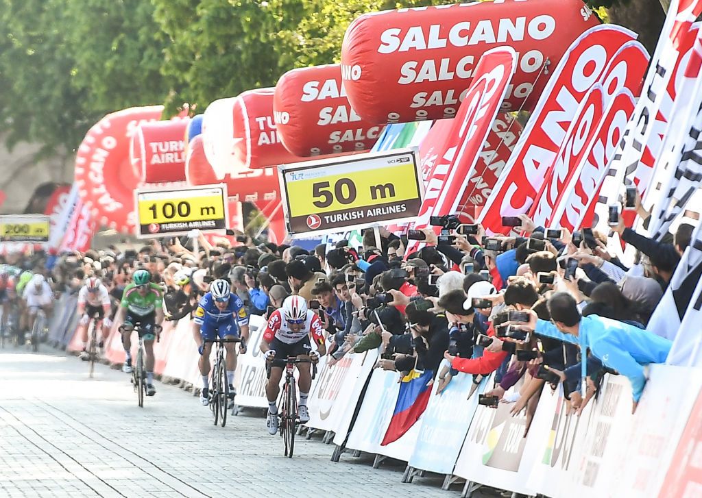 Ewan sprinting to victory ahead of Jakobsen and Bennett