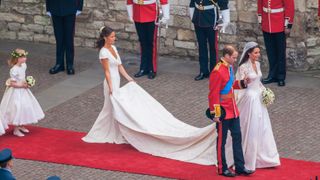 Pippa Middleton carries Kate Middleton's train on her wedding day