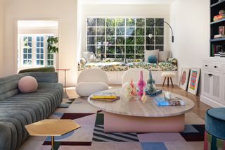 colorful printed large area rug in living room by LALA Reimagined