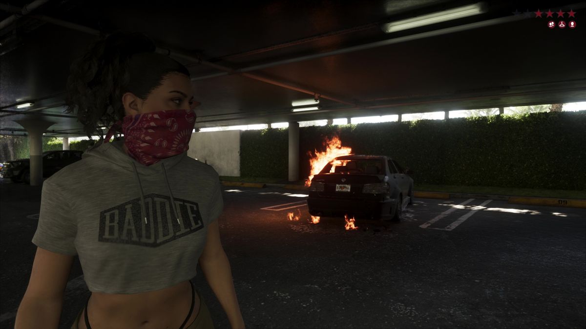 Lucia burns a car with a molotov while wearing a red bandana in a car park, from the GTA 6 extended look