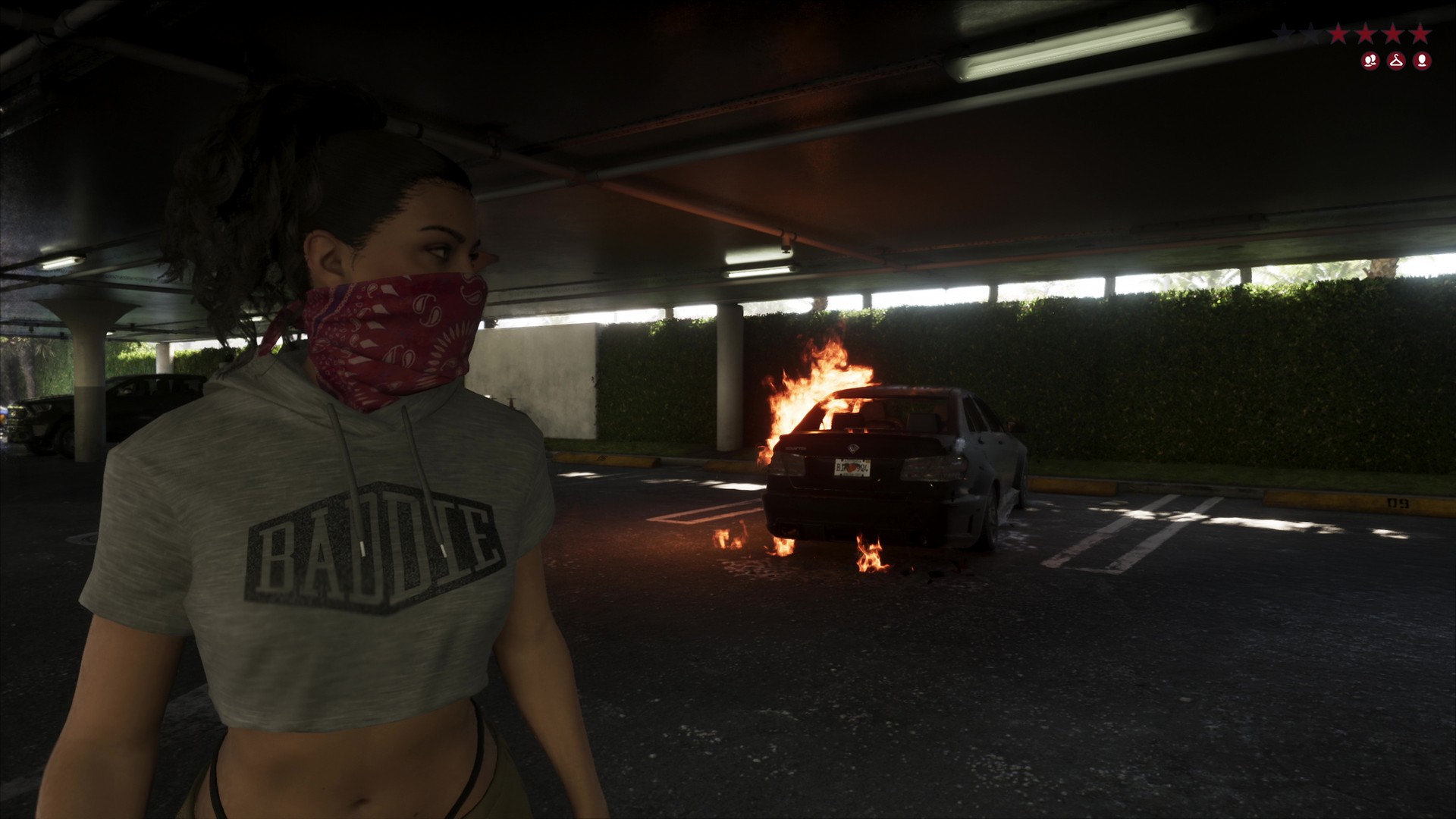 Lucia burns a car with a molotov while wearing a red bandana in a car park, from the GTA 6 extended look