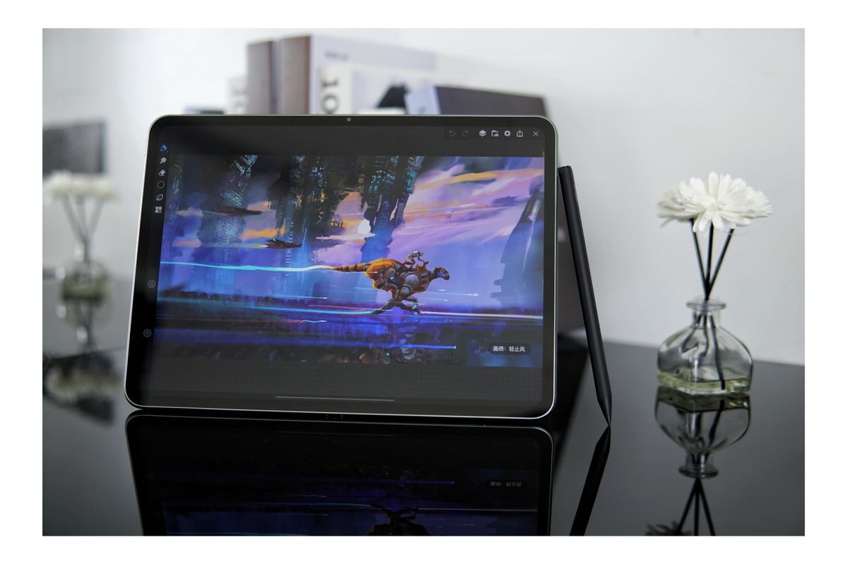 Leaked image of the OnePlus Pad Pro tablet with OnePlus Stylo pencil leaning against. The screen shows a cartoon playing