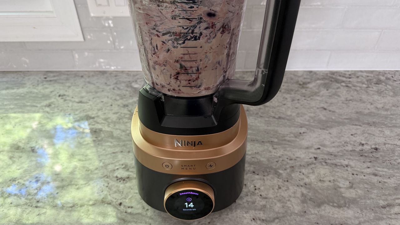 Ninja CrushBOSS making cherry frozen yogurt