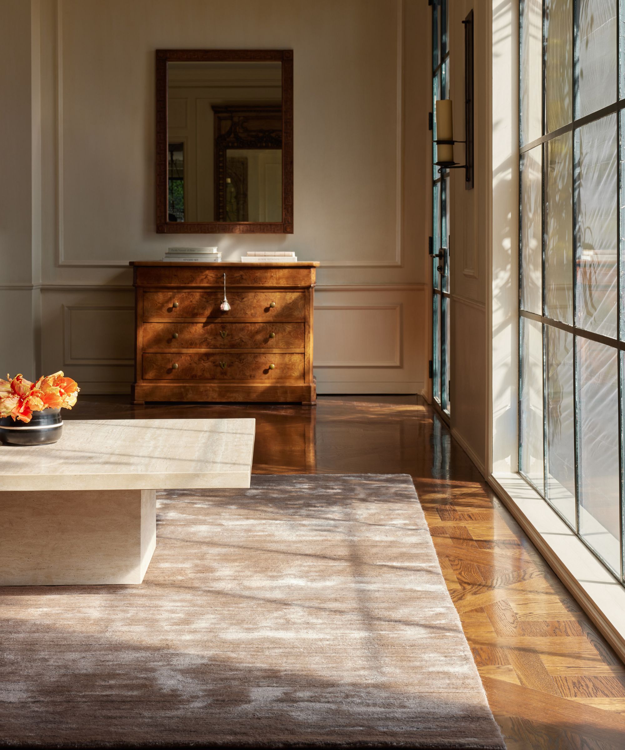 A living room with a rug