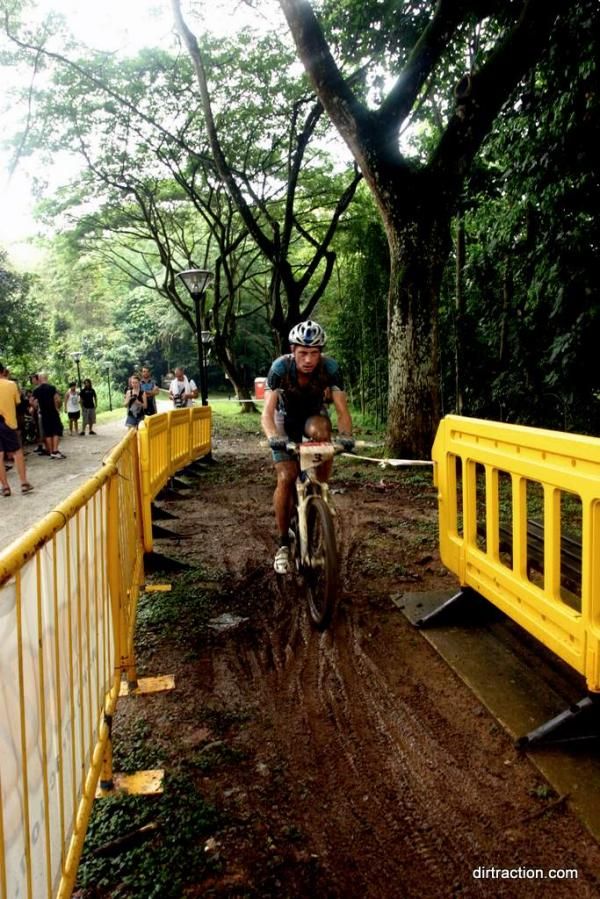 Tim Clarsen (CannAsia-Cannondale) demonstrate his versatility in muddy condition.