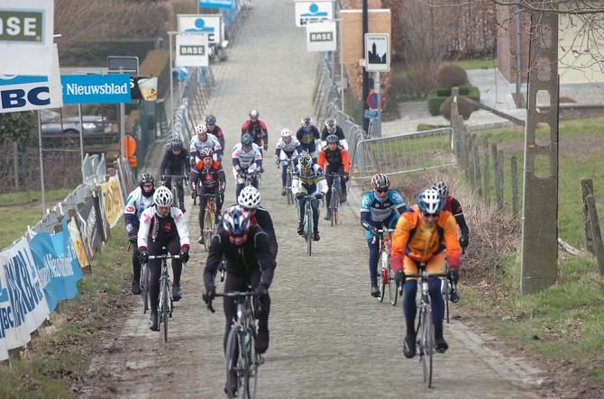 Juan Antonio Flecha (Vacansoleil) mixes in with a group of tourists scouting out the Koppenberg