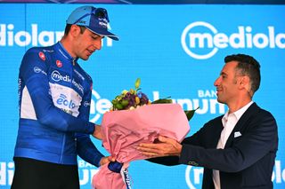 BERGAMO ITALY MAY 21 Davide Bais of Italy and Team EOLOKometa Blue Mountain Jersey celebrates at podium during the 106th Giro dItalia 2023 Stage 15 a 195km stage from Seregno to Bergamo UCIWT on May 21 2023 in Bergamo Italy Photo by Stuart FranklinGetty Images