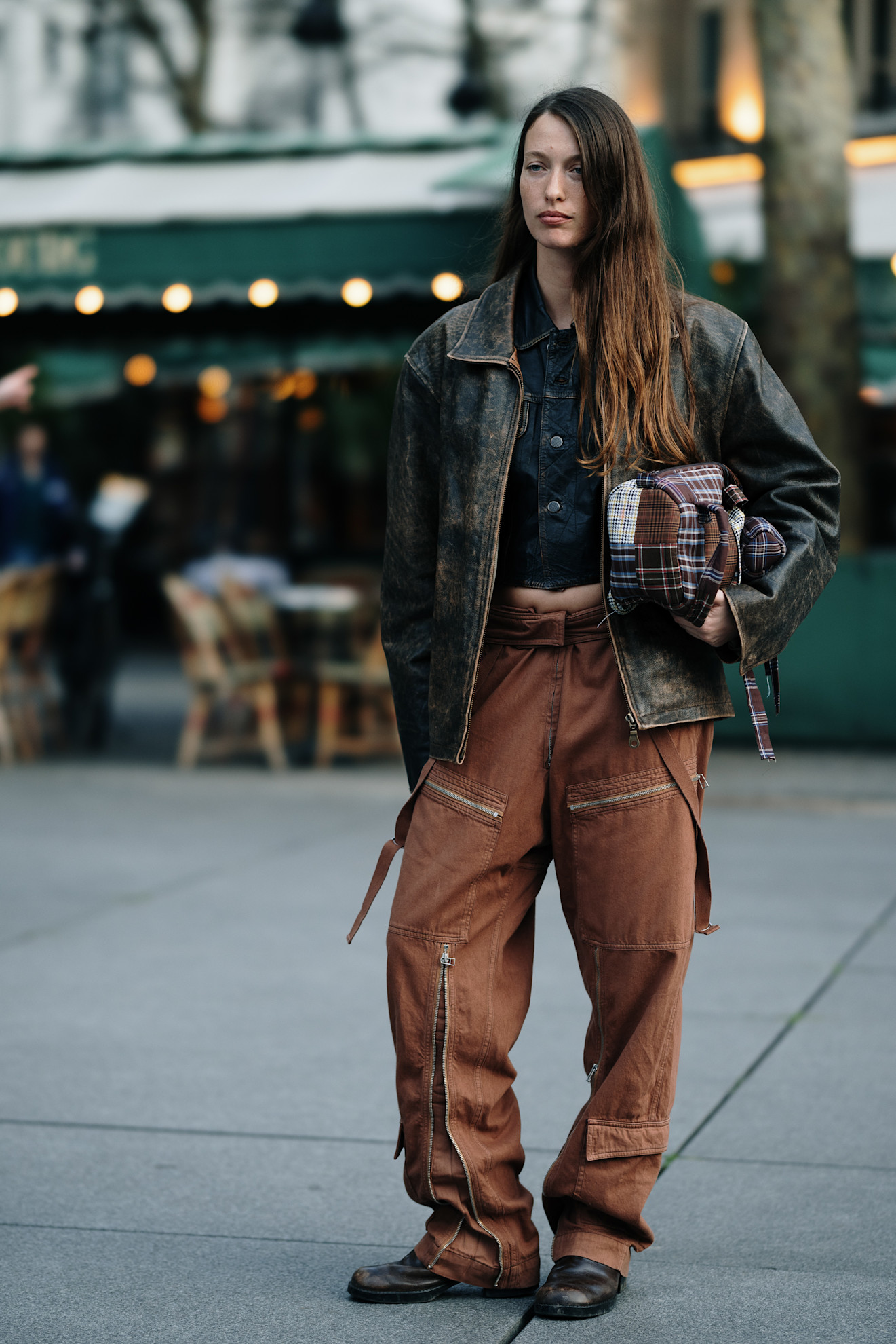 woman wearing brown cargo pants in paris