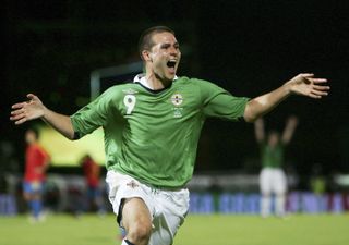 David Healy celebrates after scoring for Northern Ireland against Spain in 2006.