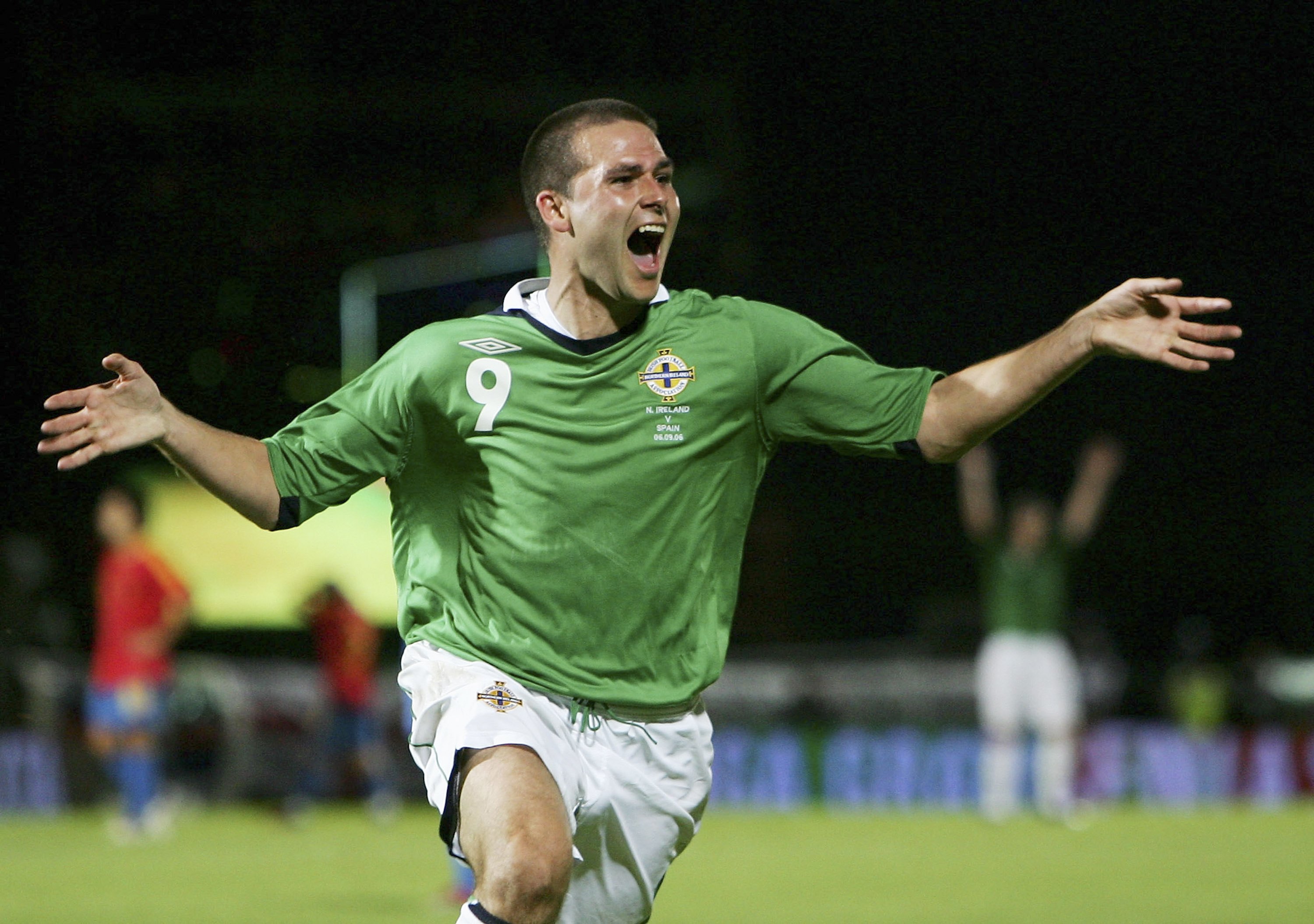 David Healy celebrates after scoring for Northern Ireland against Spain in 2006.