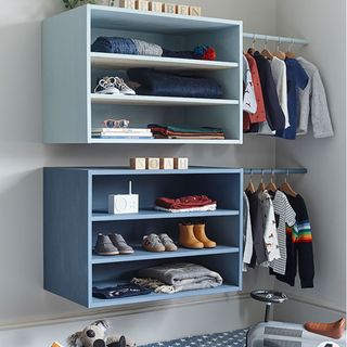 open wardrobe with baby clothes storage