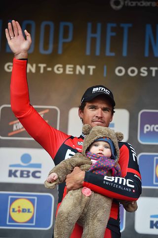 Greg Van Avermaet (BMC) with his baby on the podium at Omloop Het Nieuwsblad