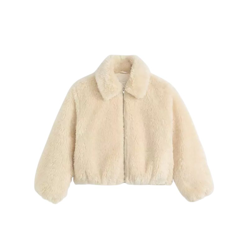 A cutout of a cream faux fur jacket