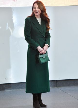 Kate Middleton wearing a green coat.