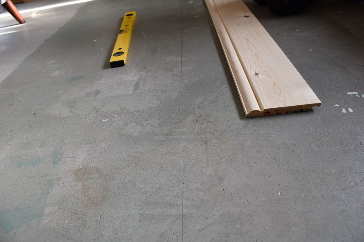 A grey subfloor before the wooden parquet floor is laid
