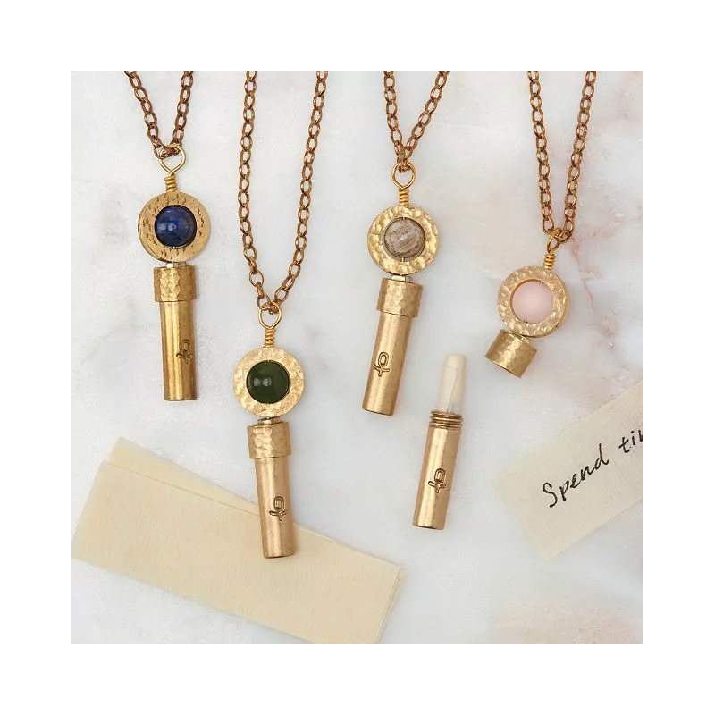 This 50th birthday gift idea, Wishbeads Intention Necklace, allows her to make a wish and carry it close to her heart