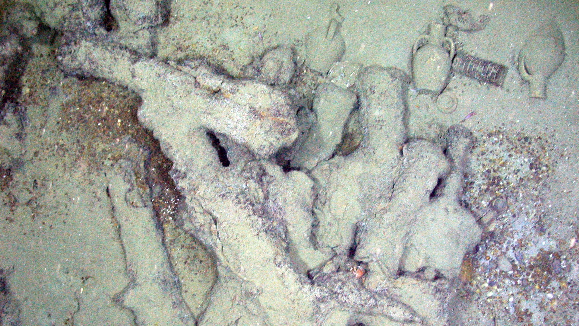 An underwater photo of urns found in a shipwreck