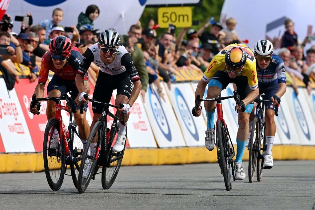 DUSZNIKIZDROJ POLAND JULY 31 EDITORS NOTE Alternate crop LR Micha Kwiatkowski of Poland and Team INEOS Grenadiers Rafa Majka of Poland and UAE Team Emirates Matej Mohori of Slovenia and Team Bahrain Victorious Yellow leader jersey and Ilan Van Wilder of Belgium and Team Soudal Quick Step sprint at finish line during the 80th Tour de Pologne 2023 Stage 3 a 1623km stage from Walbrzych to DusznikiZdroj 668m UCIWT on July 31 2023 in DusznikiZdroj Poland Photo by Dario BelingheriGetty Images