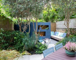garden with blue painted built in fireplace