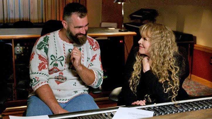 Jason Kelce and Stevie Nicks behind a mixing desk