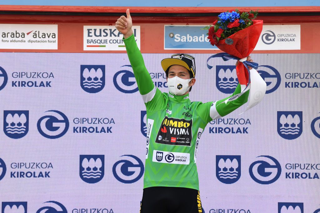 ONDARROA SPAIN APRIL 09 Podium Primoz Roglic of Slovenia and Team Jumbo Visma Green Points Jersey Celebration during the 60th ItzuliaVuelta Ciclista Pais Vasco 2021 Stage 5 a 1602km stage from Hondarribia to Ondarroa Mask Covid Safety Measures itzulia ehitzulia on April 09 2021 in Ondarroa Spain Photo by David RamosGetty Images