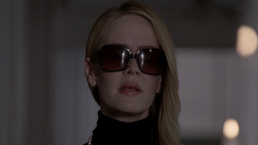 Sarah Paulson wearing sunglasses as Cordelia in AHS: Coven.