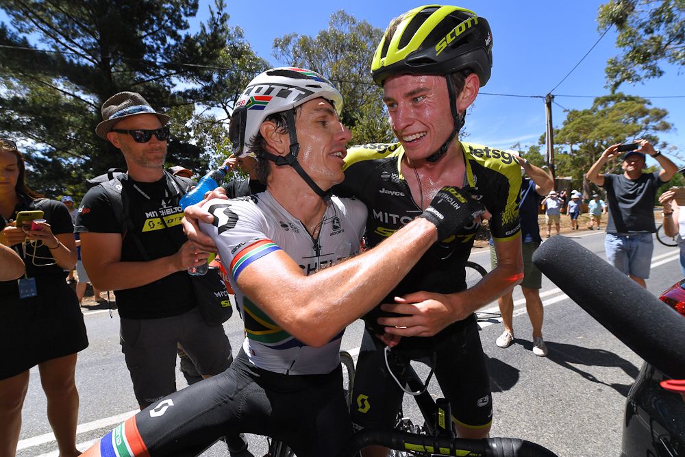 Daryl Impey and Cameron Meyer celebrates Impey's overall win at the Tour Down Under