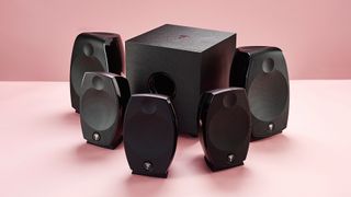 Focal Sib Evo speaker system unboxed on pink background