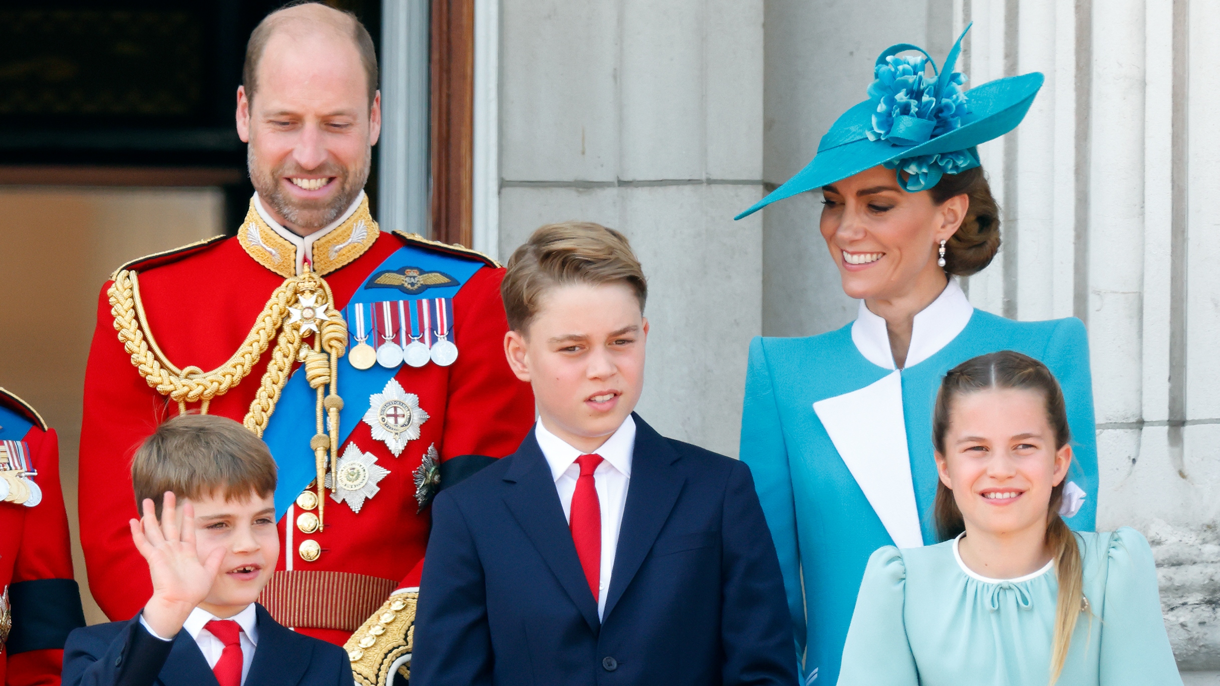 Prince William, Prince Louis of Wales, Prince George of Wales, Catherine, Princess of Wales and Princess Charlotte of Wales watch an RAF flypast after attending Trooping The Colour 2025 on June 14, 2025