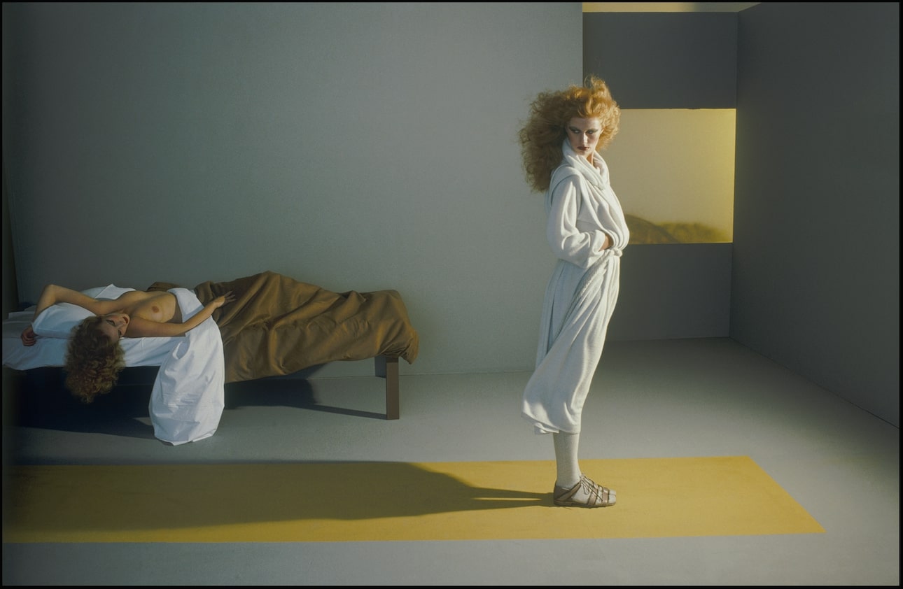 Versace campaign with two models in Edward Hopper style scene
