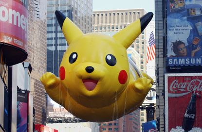 A Pokemon character floats in a parade