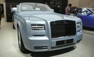 Grey Rolls-Royce Art Deco feature details such as mother-of-pearl and silver inlays, and ornamental glassware