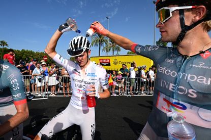 CORDOBA, SPAIN - SEPTEMBER 06: (L-R) Oscar Onley of Great Britain - White Best Young Rider Jersey and Embret Svestad-Bardseng of Norway and Netcompany INEOS Cycling Team react after the La Vuelta - 81st Tour of Spain 2026, Stage 15 a 110.2km stage from Palma del Rio to Cordoba / #UCIWT / Stage shortened due to extreme temperature weather alert / on September 06, 2026 in Cordoba, Spain. (Photo by Tim de Waele/Getty Images)