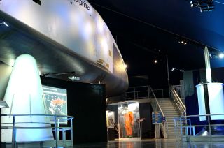 The Intrepid Museum's largest temporary exhibition, "Apollo: When We Went to the Moon" is staged under the display of the prototype space shuttle orbit Enterprise.