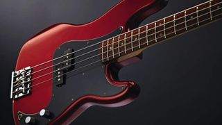 Fender bass on dark background