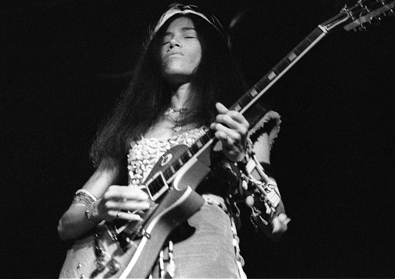 June Millington of American all-female rock band Fanny performing on stage at City Hall, Newcastle upon Tyne, 30 May 1973. She is playing a Gibson Les Paul guitar.