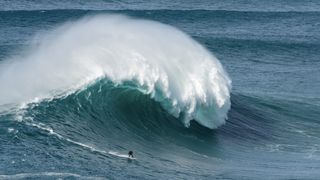 Axi Muniain (when waves are triple over-head or bigger) at Nazaré, Portugal