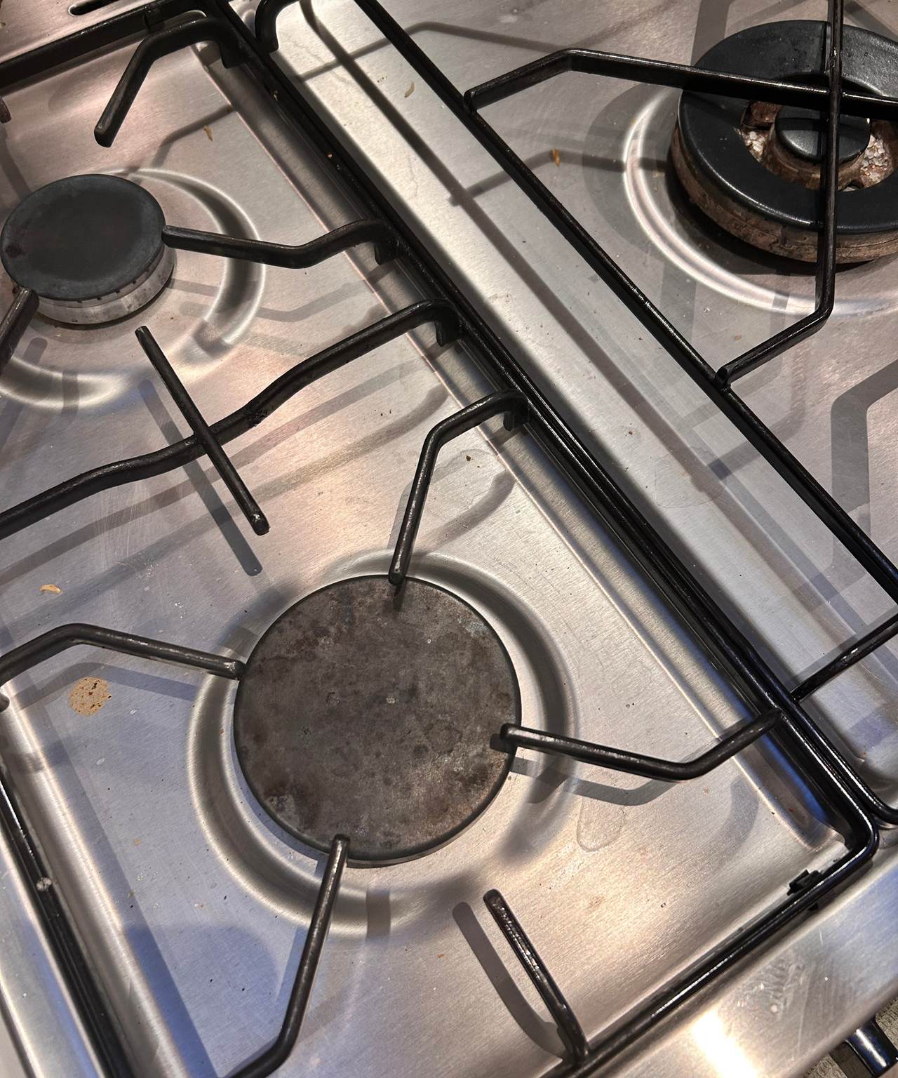 Steel hob with food stains