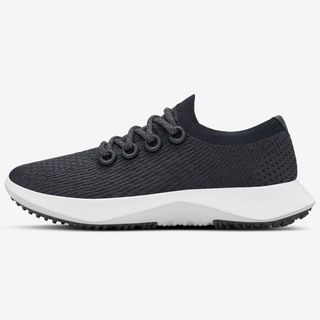 black sustainable trainer with elastic feature 