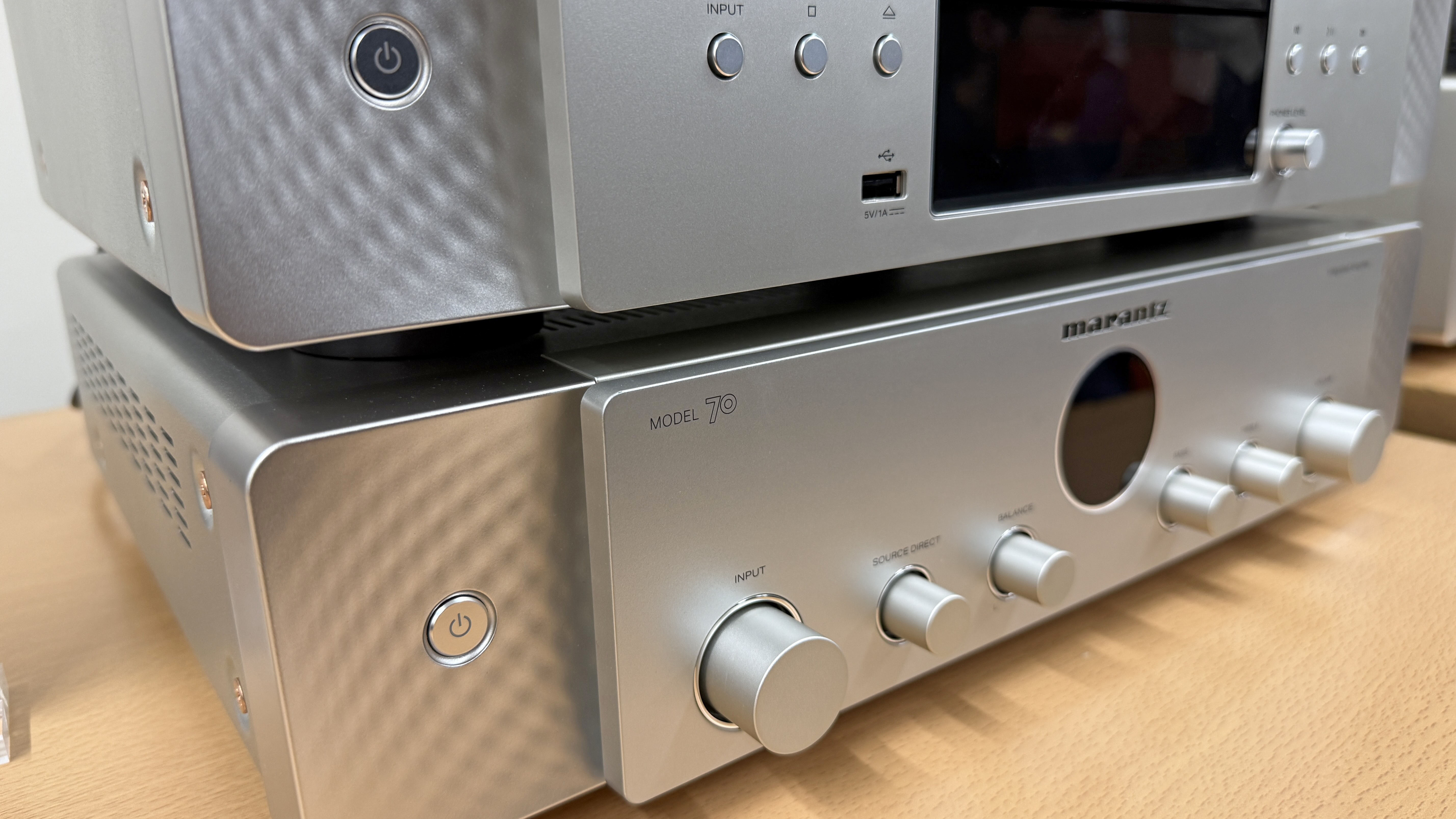 Marantz Model 70 amp and CD 70 CD player on a wooden surface