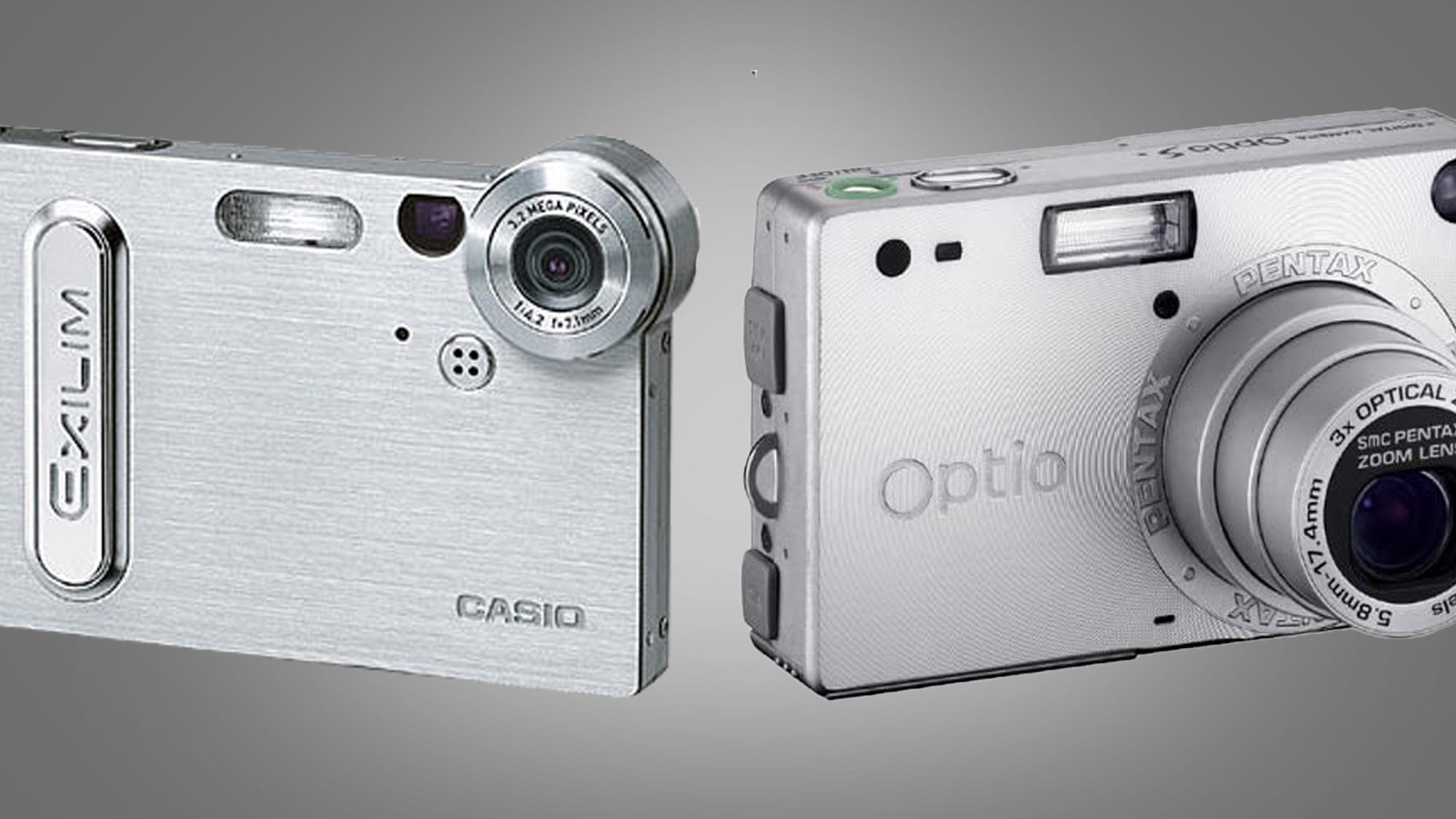 A Casio and Pentax compact camera side by side on a gray background