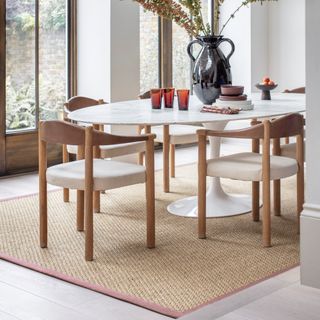 Alternative Flooring Sisal Kayal Pamba Rug with Single Twill Rudu Border in a dining room