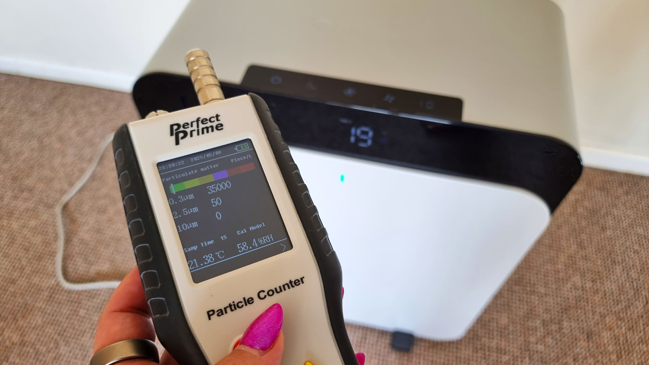 BlueAir Classic Pro CP7i being tested using an air particle monitor