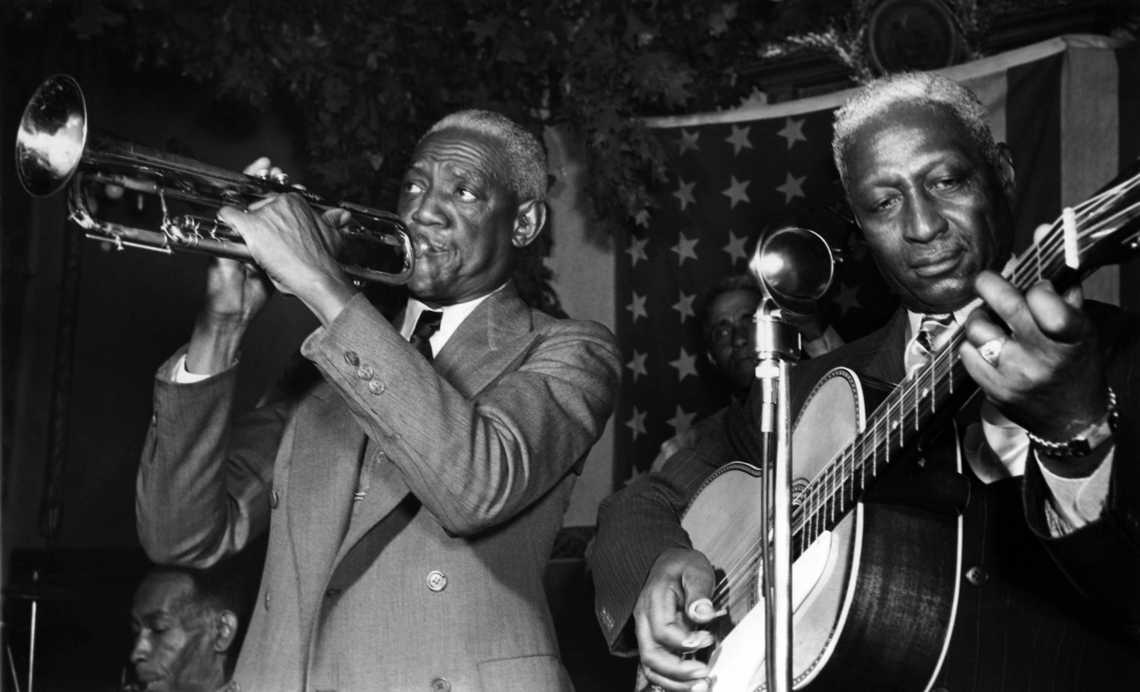 Leadbelly playing with George Lewis and Bunk Johnson