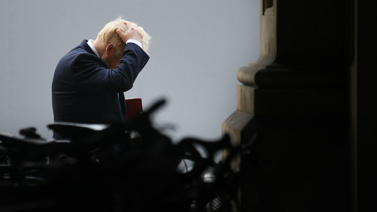 Boris Johnson walks back to 10 Downing Street from the Foreign and Commonwealth Office.