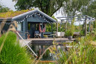 Swimming pool with summer house