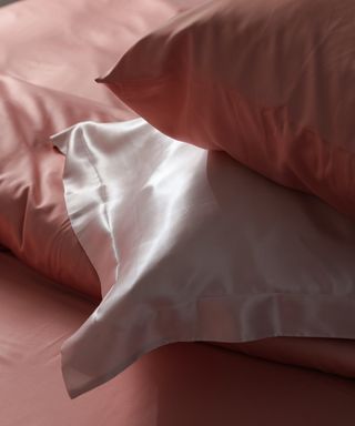 Three shades of silk pillowcases in ambient light