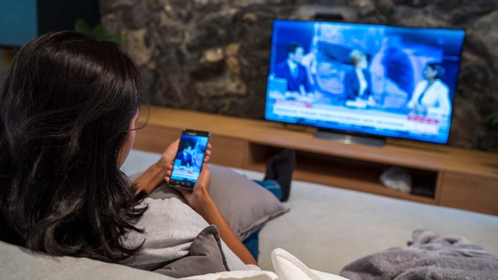 woman watching connected TV