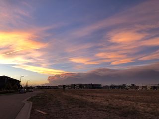 Smoke from the East Troublesome Fire in Grand County, Colorado, is visible at sunset on Wednesday (Oct. 21) in northeast Denver, more than 60 miles (101 kilometers) from where the fire was burning.